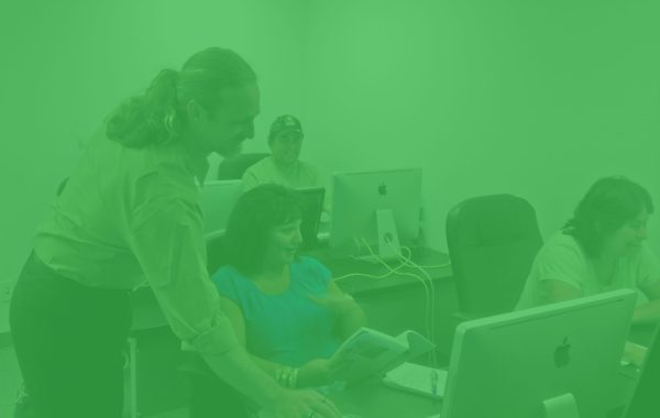 Pariah Burke teaching a classroom full of happy students